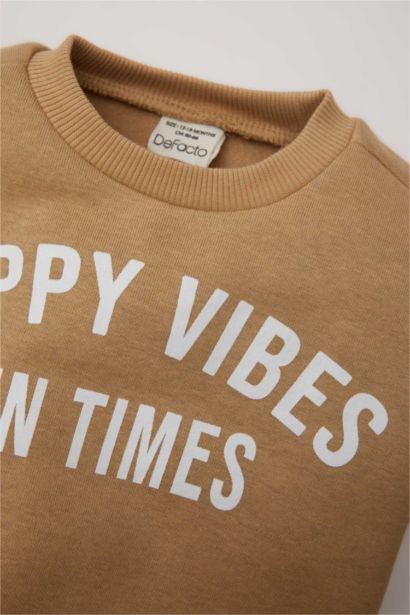 طقم بيبي اولادي سويت شيرت وسويت بانتس بطبعة شعار قصة عادية - قطعتين