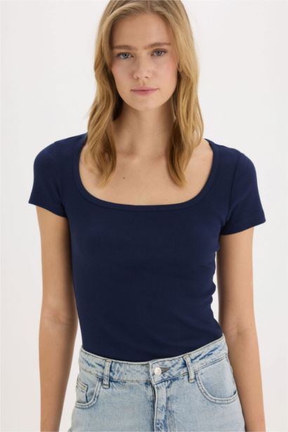 Body slim à col rond et manches courtes avec boutons-pression