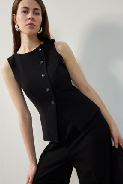 Gilet avec boutons à col rond et coupe régulière