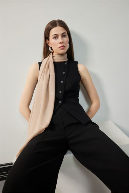 Gilet avec boutons à col rond et coupe régulière