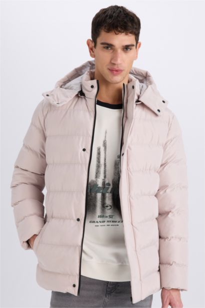 قمصلة نفخ قصة عادية بغطاء للرأس بسحاب وجيب