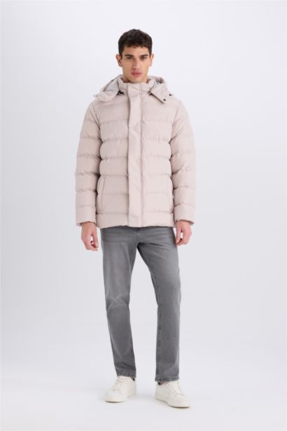 قمصلة نفخ قصة عادية بغطاء للرأس بسحاب وجيب