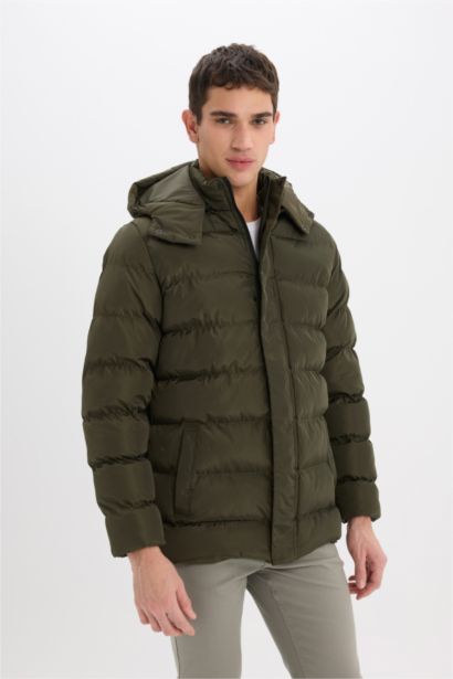 قمصلة نفخ قصة عادية بغطاء للرأس بسحاب وجيب