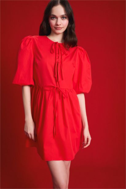 فستان ميدي بوبلين بقصة A بياخة مستديرة