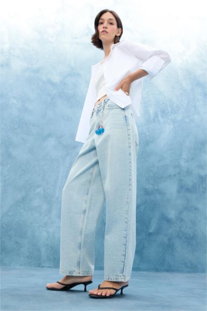 بنطلون جينز باجي فيت برجل عادي وخصر عالي