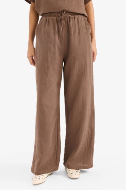 بنطلون وايد ليج قماش كرنكيل بجيب وخصر مطاطي