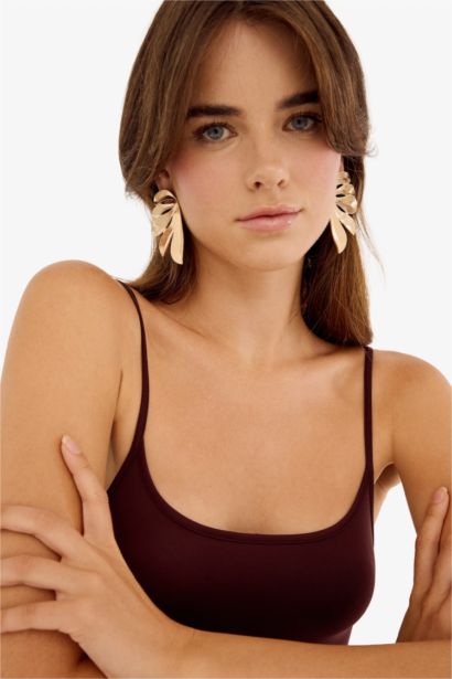 Boucles d’oreilles dorées femme