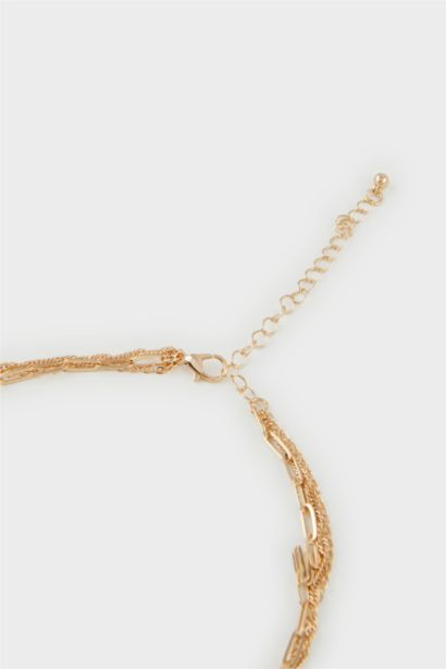 Женское потройное золотое колье