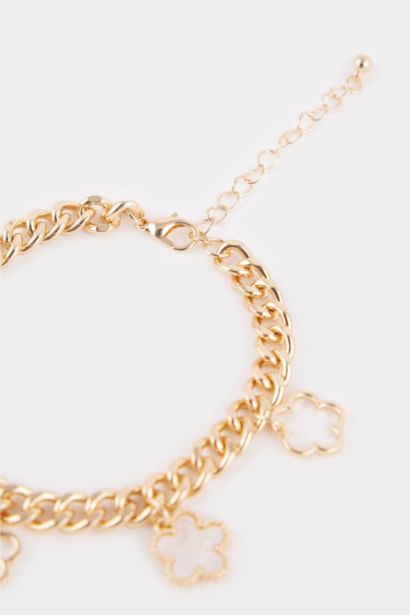 Bracelet doré épais à fleurs blanches pour femme