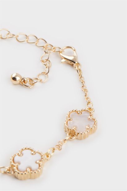 اسورة  نسائية ذهبية ورد أبيض