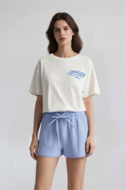 تيشيرت نص كم اوفر سايز بطبعة من الخلف