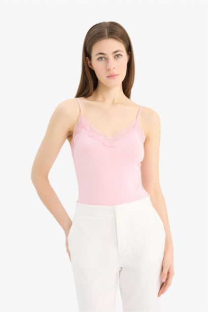 Débardeur slim à col V avec détails en dentelle