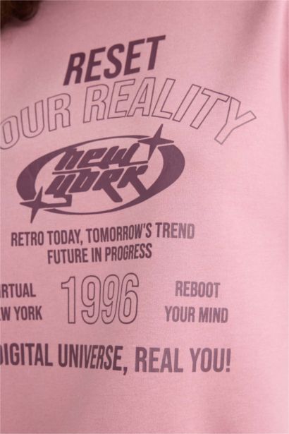 سويت شيرت مطبوع قصة عادية برقبة مستديرة