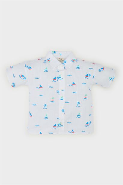 قميص نص كم بيبي اولادي بطبعة بحر قصة عادية