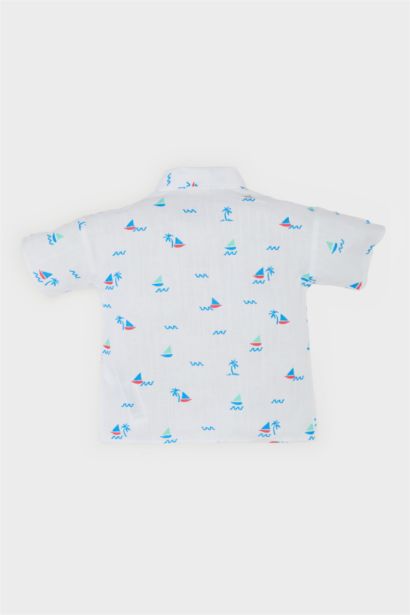 قميص نص كم بيبي اولادي بطبعة بحر قصة عادية