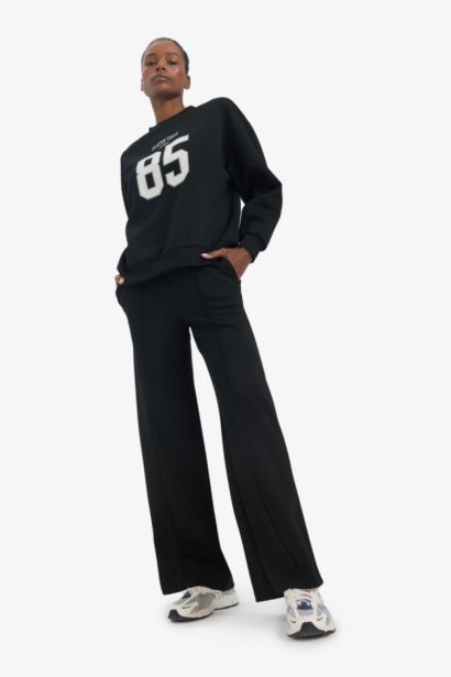 سويت شيرت رياضي اوفر سايز قماش سكوبا من DeFactoFit