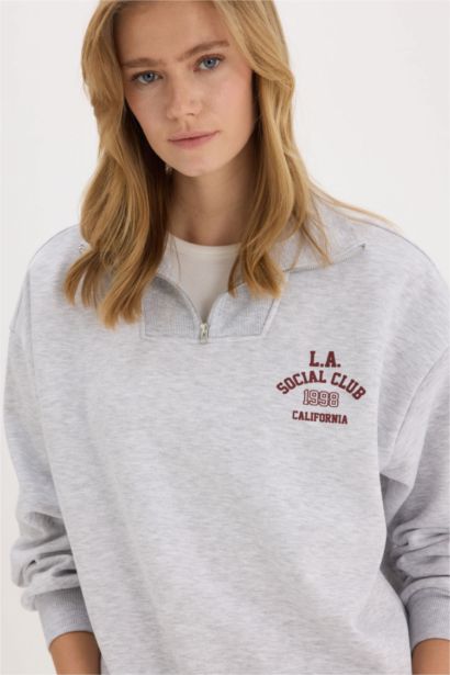 Sweatshirt oversize imprimé à col montant avec fermeture zip