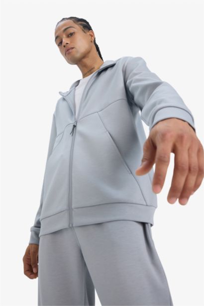 سويت شيرت بسوستة قماش سكوبا قصة عادية بكابيشون جيب ويلت