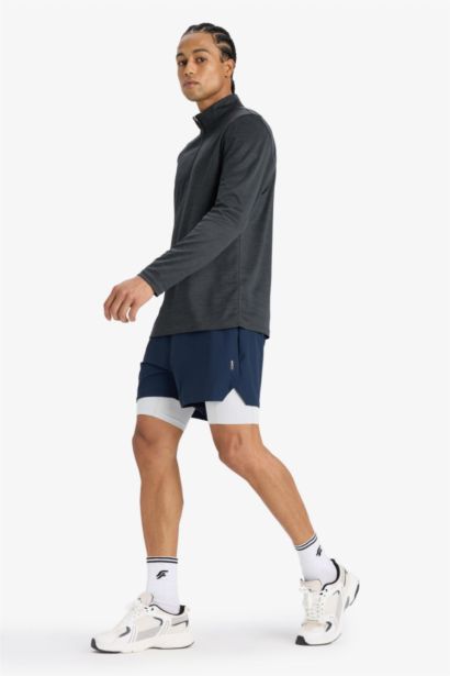 شورت قصير رياضي سليم فيت من DeFactoFit