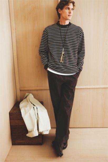 سويت شيرت مخطط قصة مريحة برقبة مستديرة