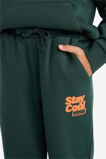 بنطلون سويت بانتس تقيل بطبعة شعار قصة عادية