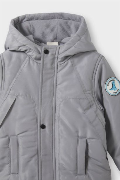 قمصلة بيبي ولادي مقاوم للماء بغطاء للرأس