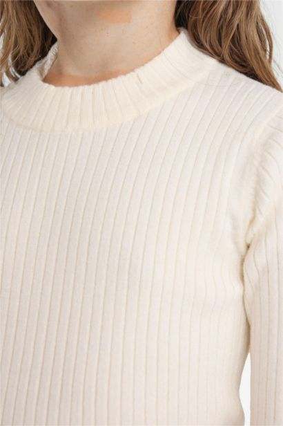 بلوفر تريكو بنات مضلع سليم فيت برقبة مستديرة