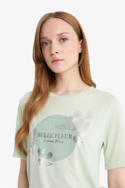 T-shirt imprimé à col rond et manches courtes Coupe régulière