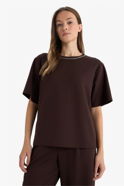 T-shirt imprimé à col rond et manches courtes Coupe régulière