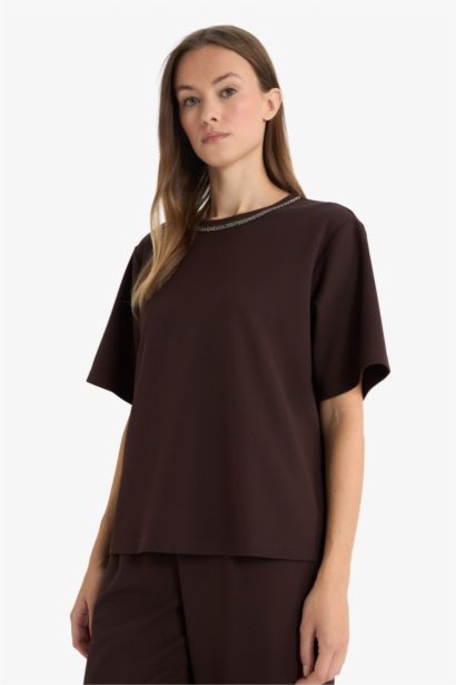 T-shirt imprimé à col rond et manches courtes Coupe régulière