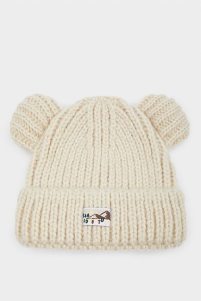 Dokuma Etiketli Kulaklı Triko Bere Kız Bebek