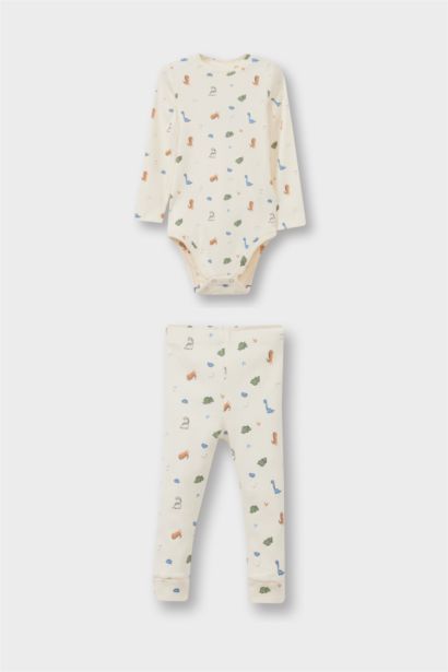 سيت بيبي ولادي اوفر وبنطلون مضلع بطبعة ديناصور - قطعتين