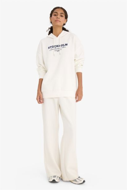 سويت شيرت اوفر سايز بغطاء للرأس وطبعة حروف