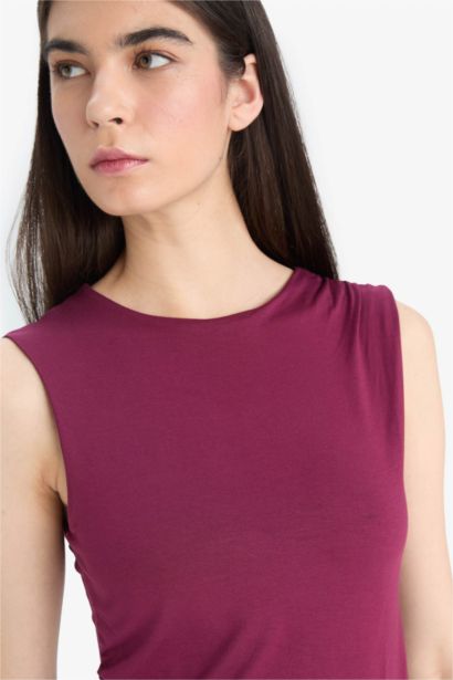 Top sans manches slim basique à col rond Coupe asymétrique