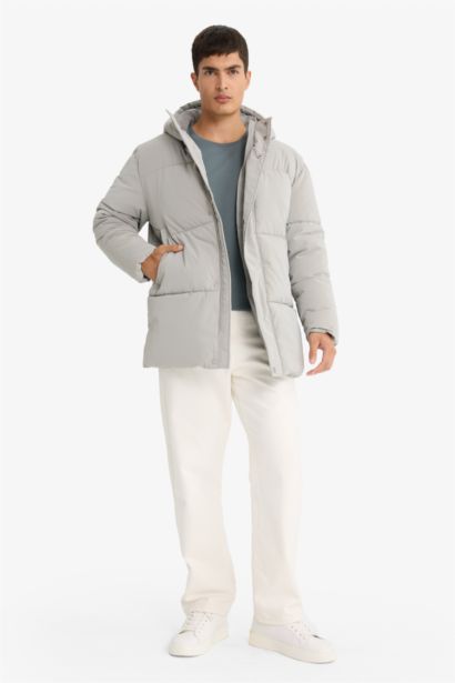 قمصلة نفخ طويل قصة عادية بغطاء للرأس مقاوم للماء