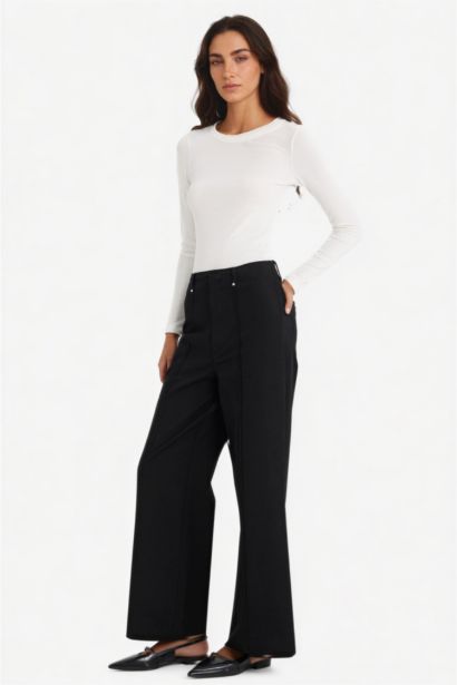 Pantalon en gabardine large taille haute à poches