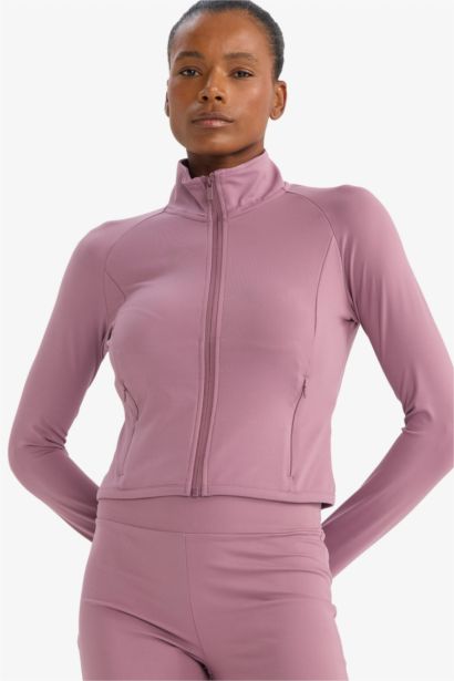 Top de sport manches longues zippé à col montant Coupe slim