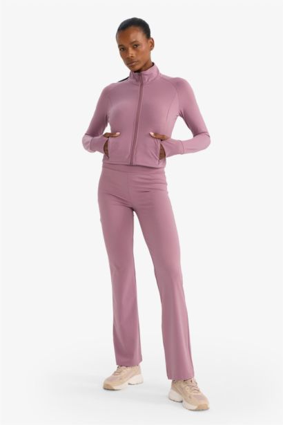 Top de sport manches longues zippé à col montant Coupe slim