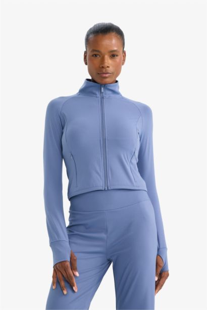 Top de sport manches longues zippé à col montant Coupe slim