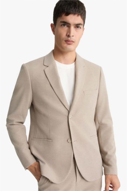 Veste blazer à boutons et poches Coupe moderne