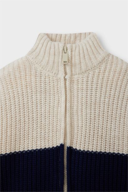 كارديجان بيبي اولادي تريكو بسوسته وياقة عالية