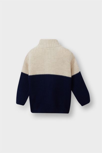 كارديجان بيبي اولادي تريكو بسوسته وياقة عالية