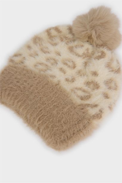 Bonnet en tricot à motif léopard avec pompon pour fille