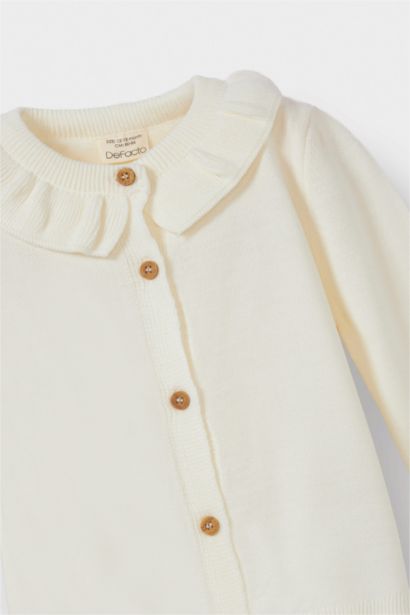 سترة قصة عادية بياقة مكشكشة