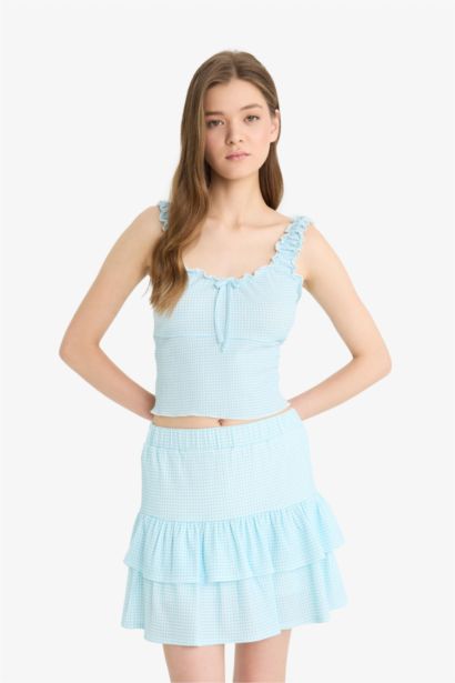 Fitted Textured Sleeveless Blouse