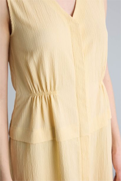 V Yaka Gofre Dokulu Kolsuz Elbise