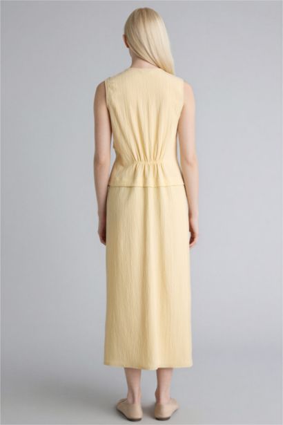 V Yaka Gofre Dokulu Kolsuz Elbise