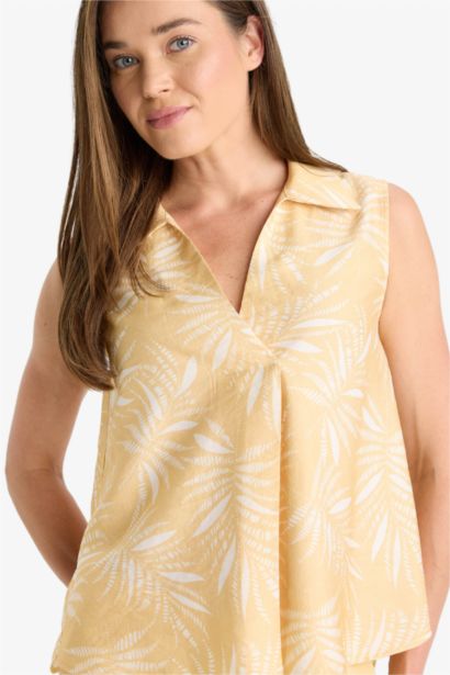 بلوزة كت منقوش بياقة مستديرة