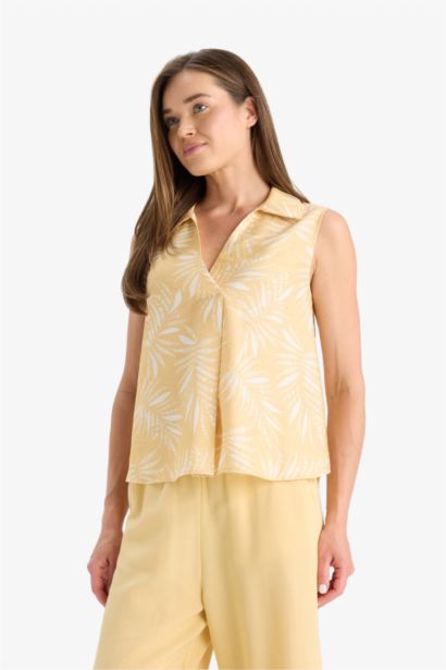 بلوزة كت منقوش بياقة مستديرة