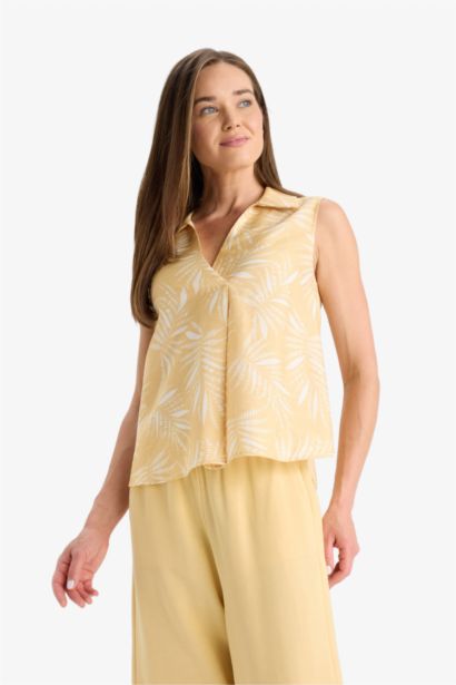 بلوزة كت منقوش بياقة مستديرة